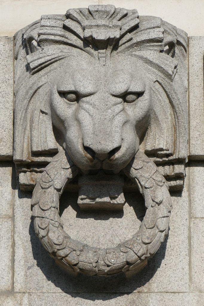 Art Deco Lion Logo - Art Deco relief sculpture of lion. On the central part of t