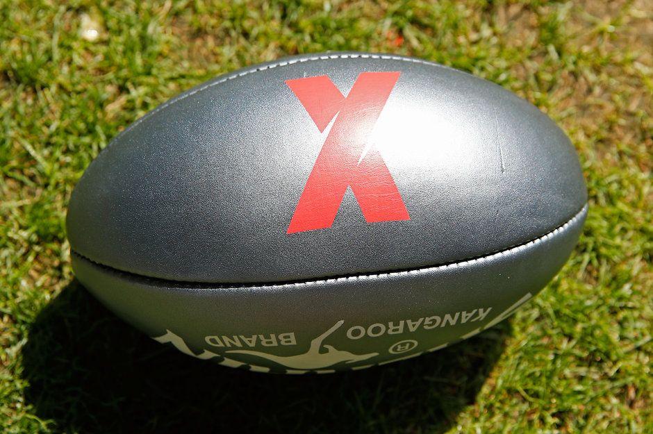 Red and Silver Ball Logo - Silver balls take AFLX back to the future.com.au