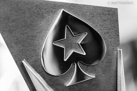 Spade with White Star Logo - https://www.pokerstars.com/en/blog/pokerstars_spade_29sept15.jpg