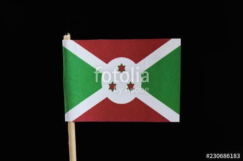 Red White Circle with Triangle Logo - A official flag of Burundi on toothpick on black background ...
