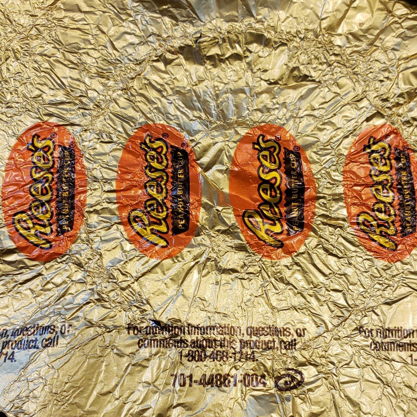 Yellow Swirl Logo - Yes, I know it's a Reese's wrapper. What does the number and swirl