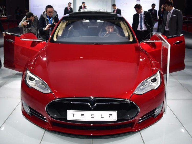 Tesla Car Logo - Elon Musk on what the Tesla logo means - Business Insider