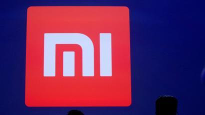 Chinese Blue and Red Logo - Xiaomi executive tells Chinese students studying Japanese at ...