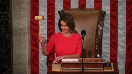 Red and White Lines with a Gavel Logo - In shutdown fight with Trump and GOP, Pelosi drew a line on governing