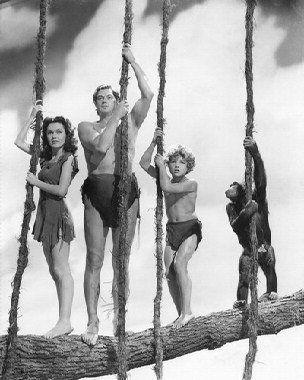 Tarzan Black and White Logo - MAUREEN O'SULLIVAN AS JANE, JOHNNY WEISSMULLER AS TARZAN, JOHNNY