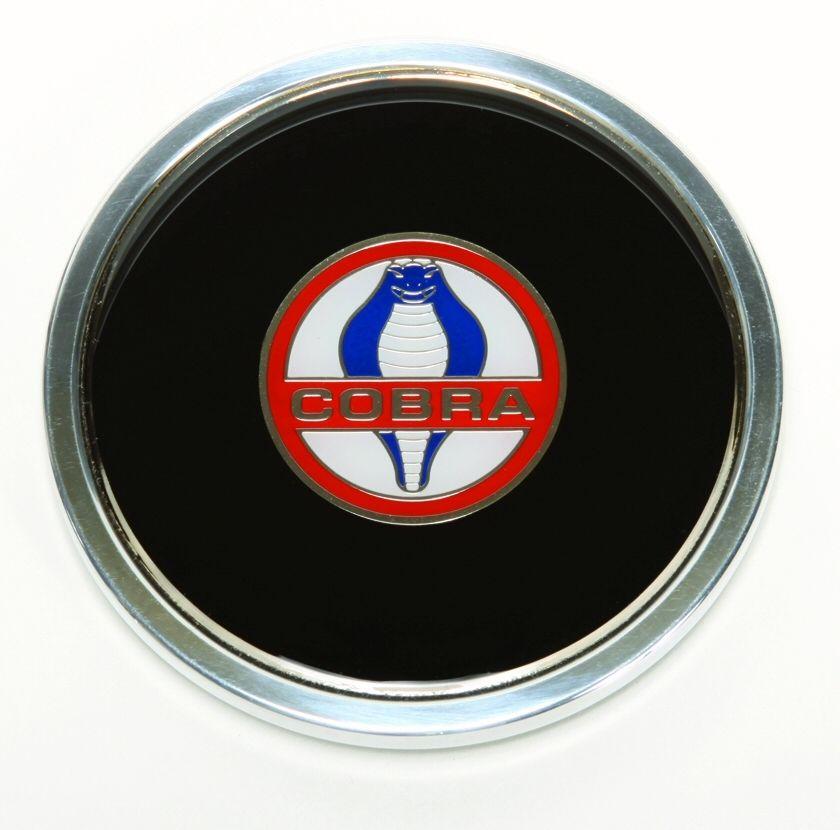 Circle in Silver with Blue Center Logo - Red, silver, and blue COBRA logo Center Cap