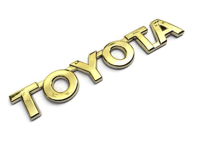 Gold Toyota Logo - TOYOTA