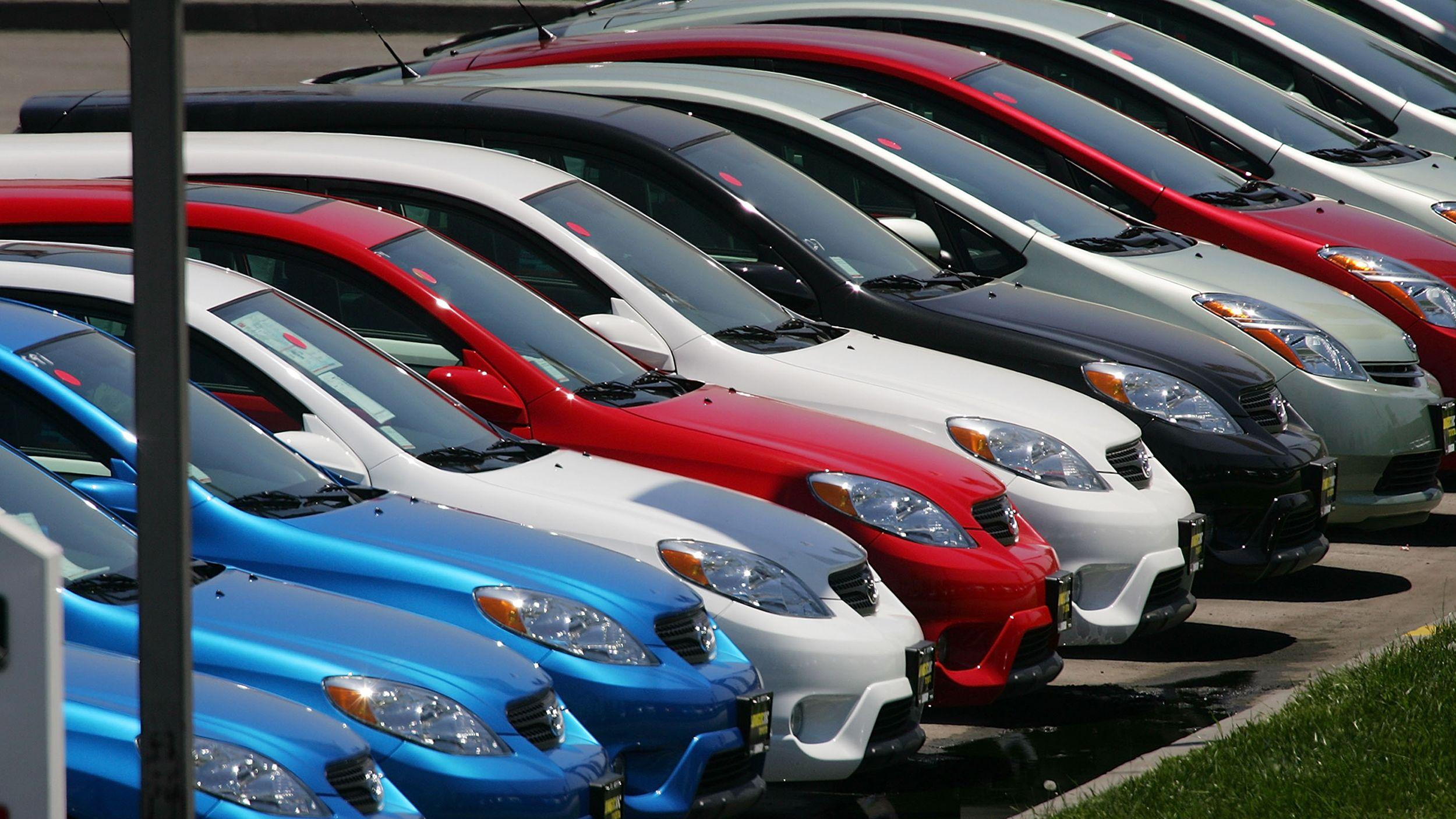 What Automobile Has a Red and White Logo - What does your car color say about you?