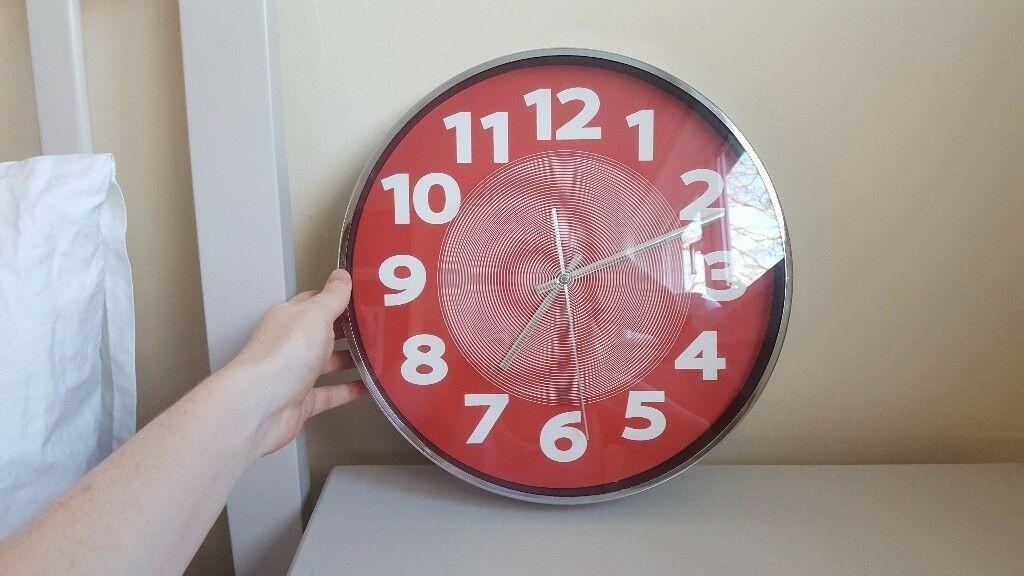 White Circle with Red Hands Logo - Scandi Wall Clock in red and white. in Carterton, Oxfordshire