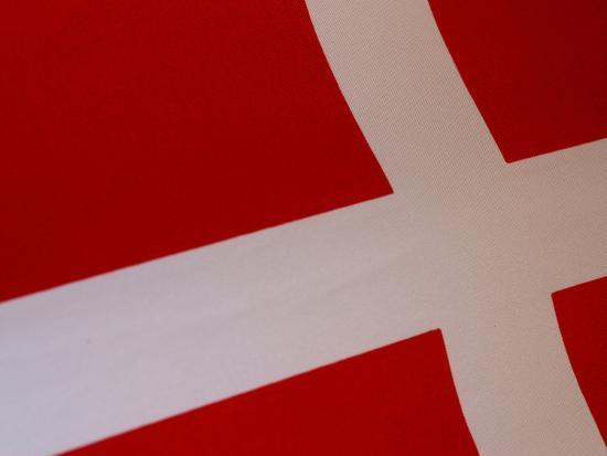Red Flag with White Cross Logo - Close-up of the Denmark Flag with a White Cross on Red Fabric ...
