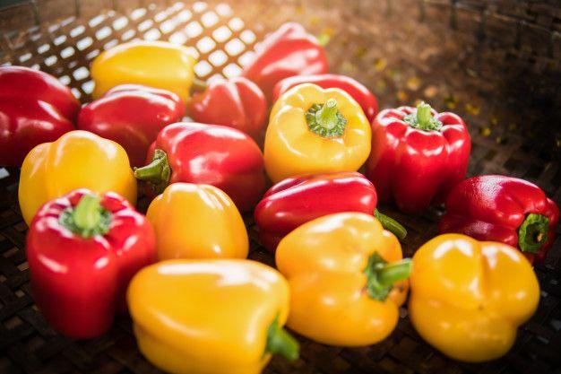 Red and Yellow Bell Logo - Fresh organic red yellow bell peppers in basket. Photo | Premium ...