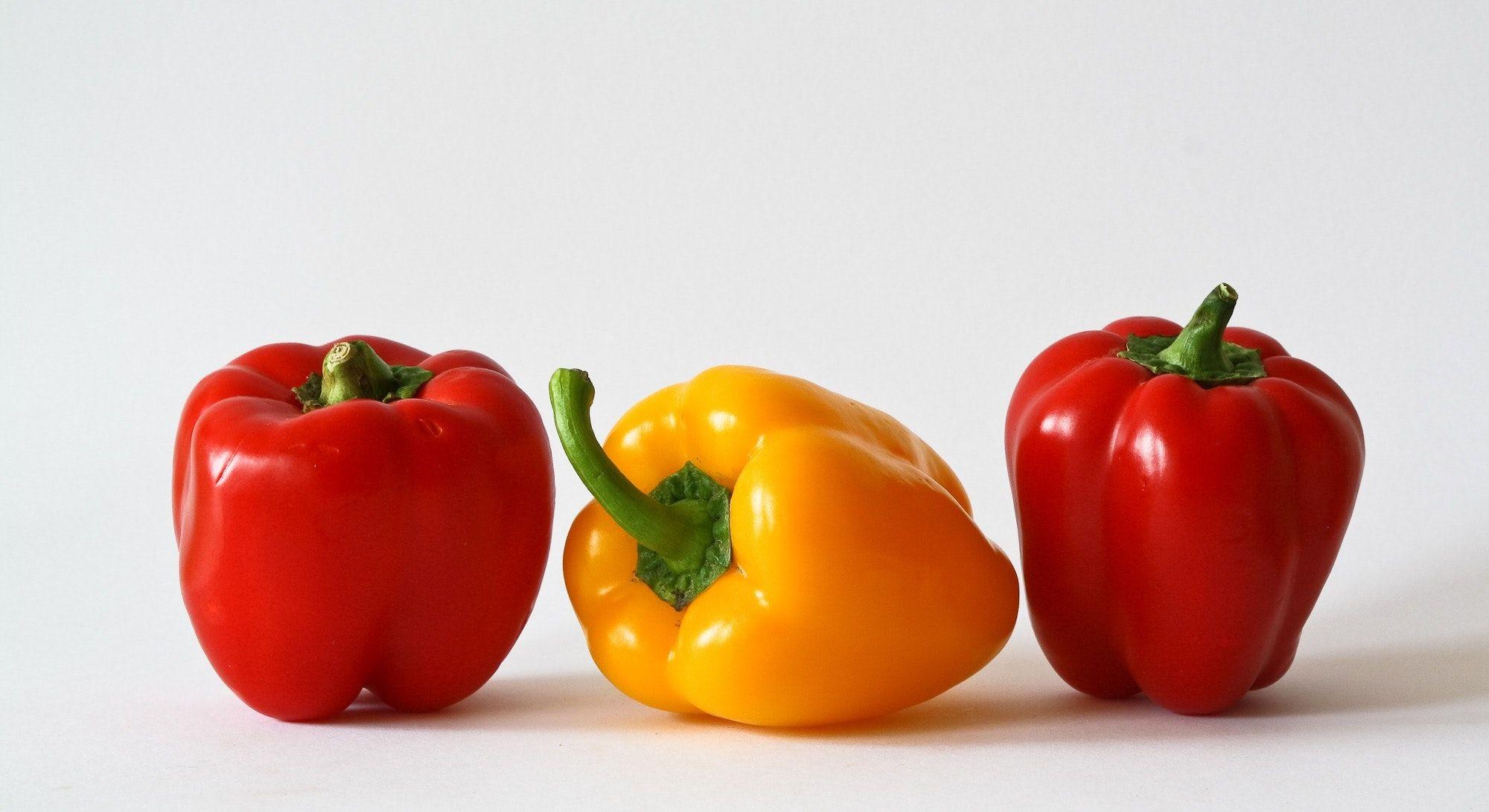 Red and Yellow Bell Logo - Yellow Bell Pepper Between 2 Red Bell Pepper · Free Stock Photo