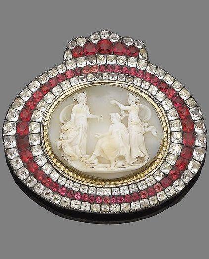 Oval Cameo with Red Logo - A late 18th century cameo and paste buckle. The oval shell plaque