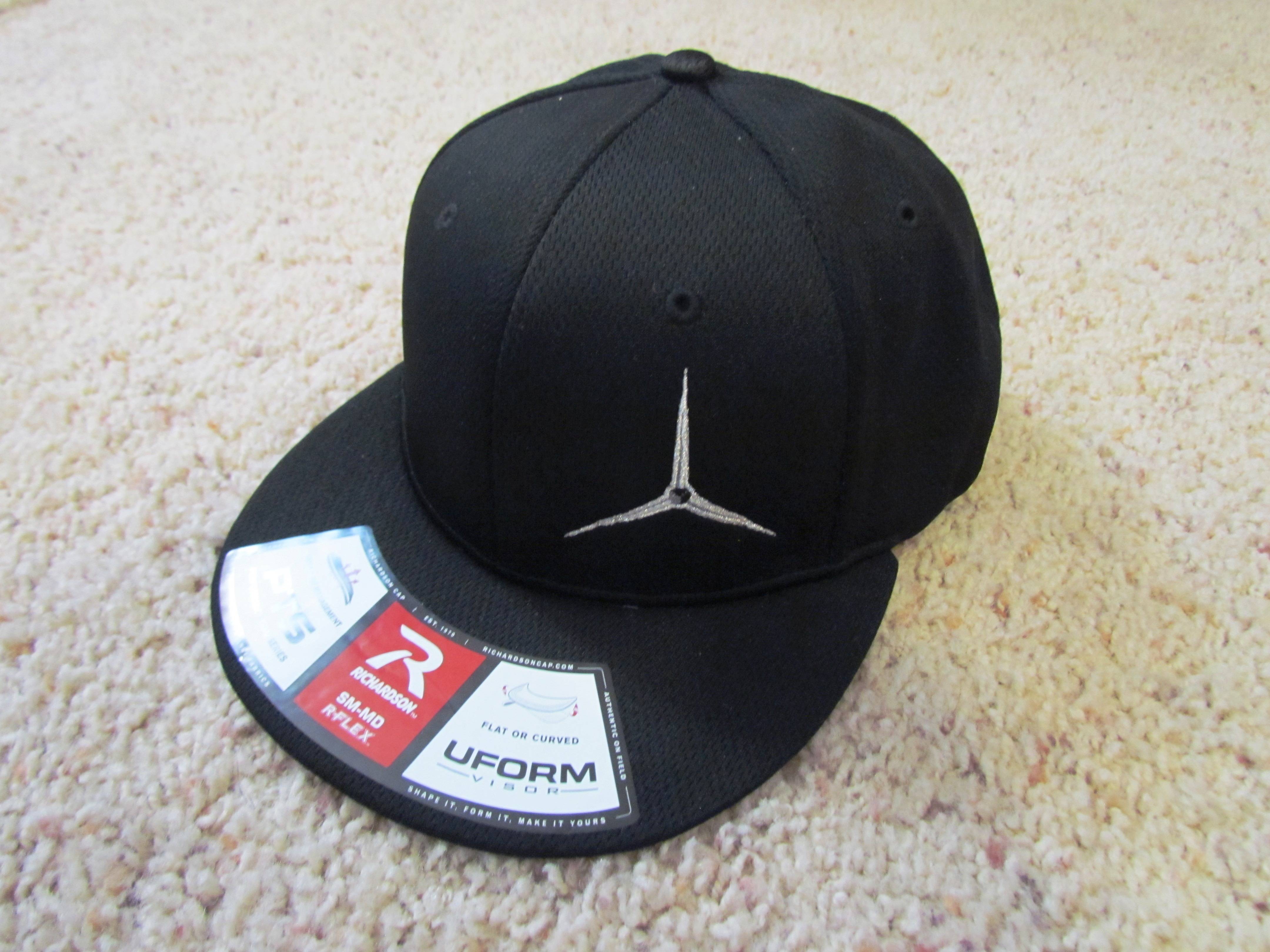 U of a Black Logo - JDMA Black Flex Fit, U Form Brim Hat With A Metallic Logo. Just Don