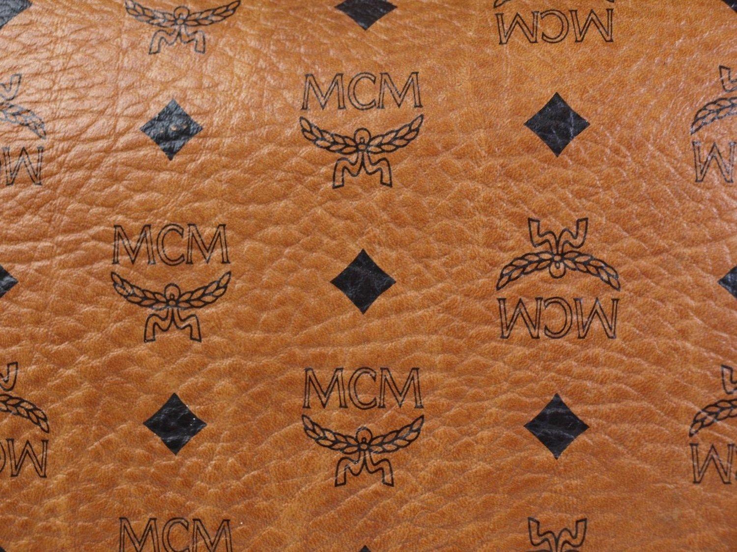 MCM Pattern Logo - MCM Logo Pattern Brown Leather Clutch Bag Purse | Reebonz Canada