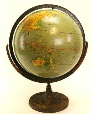 Antique World Globe Logo - Antique world globe on heavy rotating cast iron