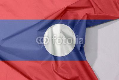 Space with Blue Red Circle Logo - Laos fabric flag crepe and crease with white space, blue red and ...