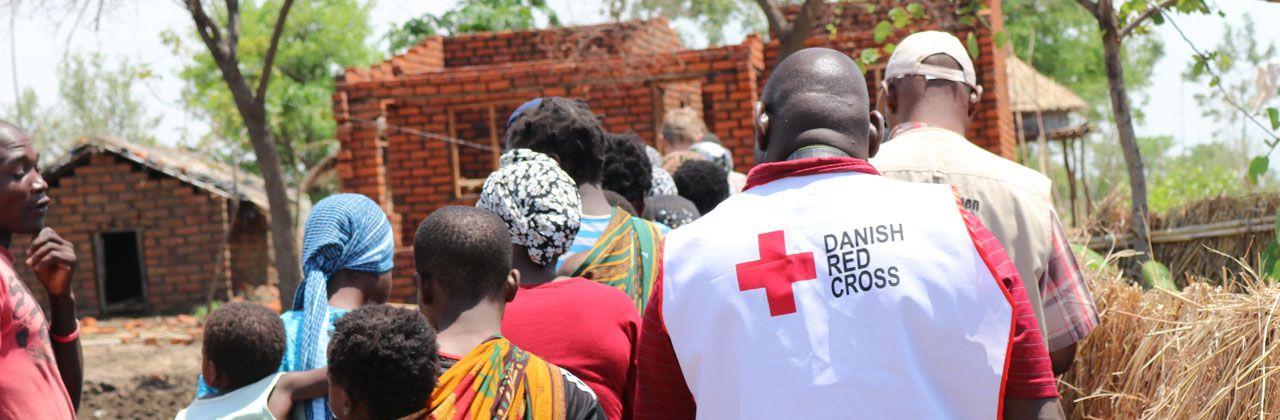 White with Red Cross Logistics Firm Logo - Community engagement | DSV
