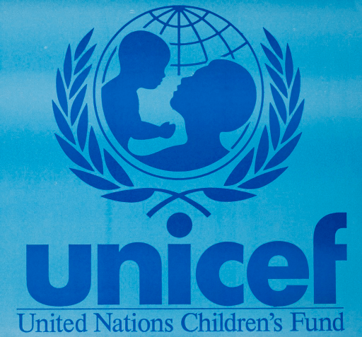 Woman Holding Baby Blue Logo - UNICEF : United Nations Children's Fund
