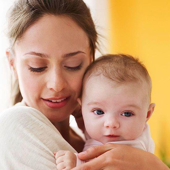 Woman Holding Baby Blue Logo - Nervous About Being a New Parent? Don't Be Scared, Mom!