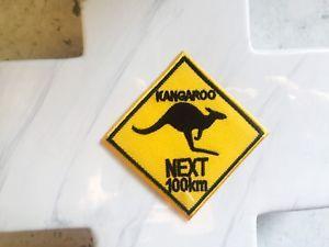 Kangaroo Triangle Logo - Triangle Yellow Australia Road Sign Kangaroo Next 100km Iron On ...