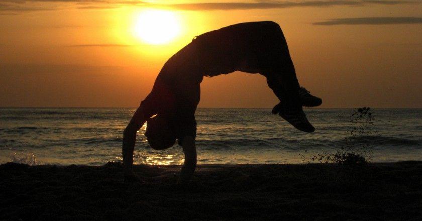 Hanstand Sunset Google Logo - Disguised in Dance: The Secret History of Capoeira