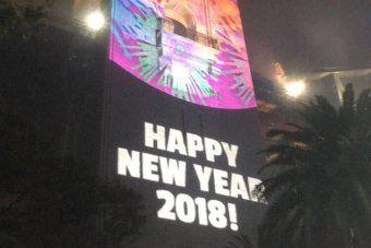 New Year 2018 Logo - New Year's Eve 2018 typo projected onto Sydney Harbour Bridge - ABC ...