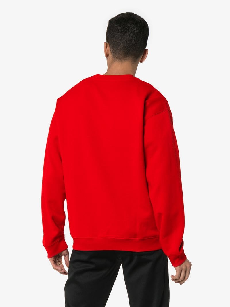 Red Person Logo - Versace red logo embroidered jumper | Browns