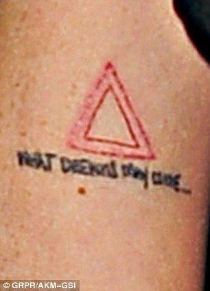 Red Triangle Face Logo - Lindsay Lohan unveils new red triangle and script tattoo as she