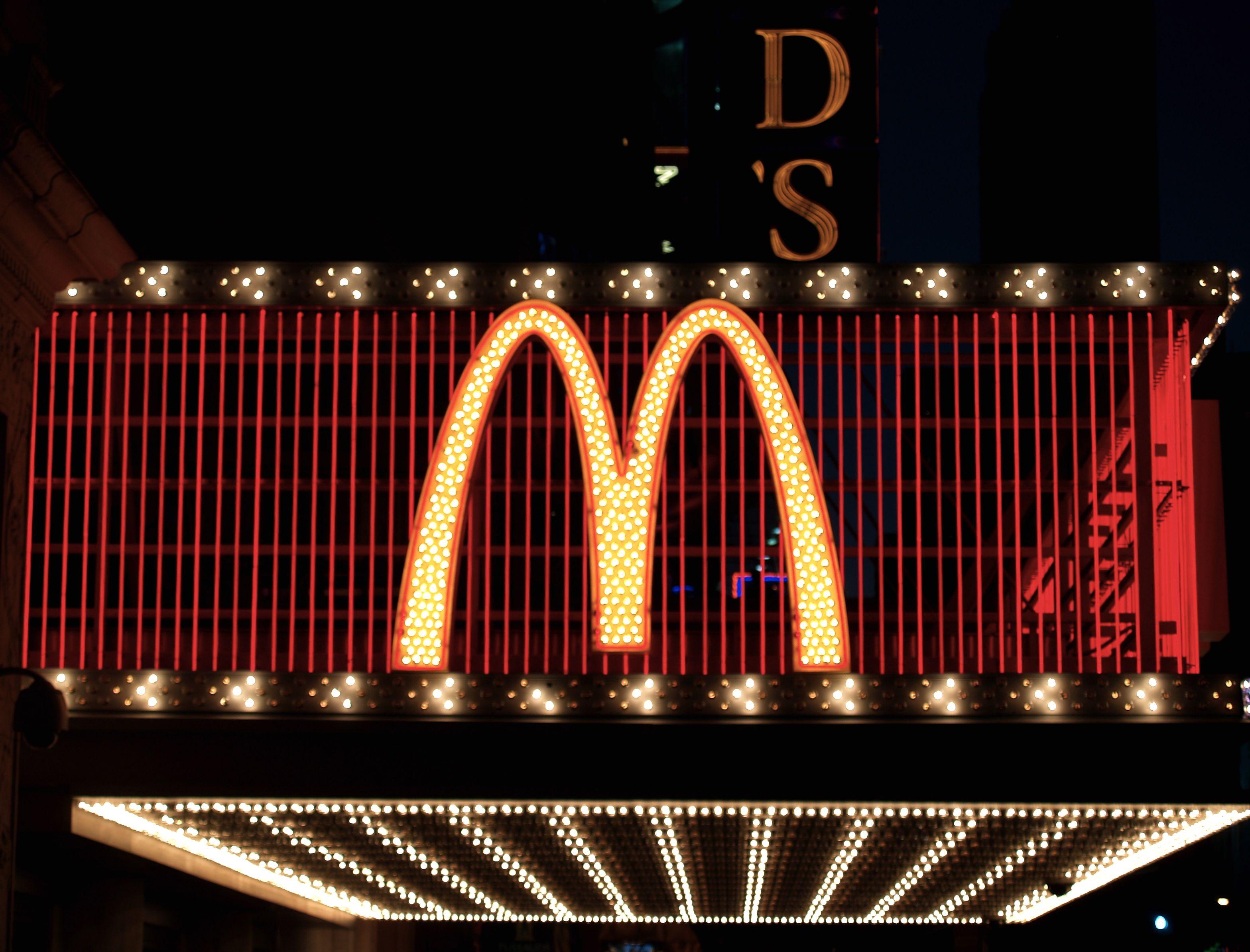 Red and Yellow with the Rock Restaurant in Title Logo - Golden Arches