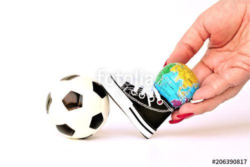 Globe Soccer Ball Logo - Football or soccer ball. Sports shoes and globe or globe. A woman's ...