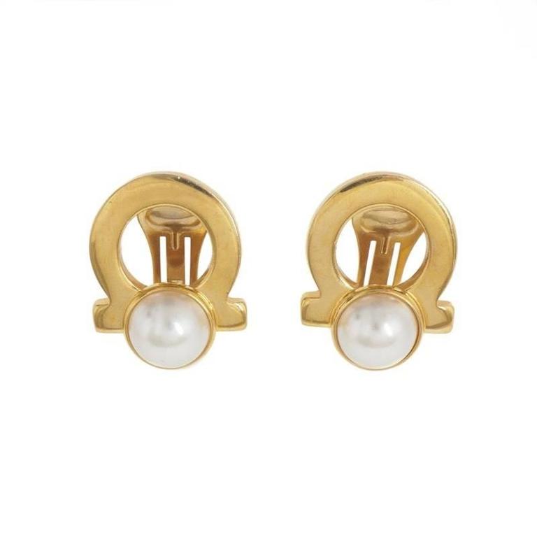 Gold Ferragamo Logo - Salvatore Ferragamo Gold Logo Pearl Evening Stud Earrings at 1stdibs