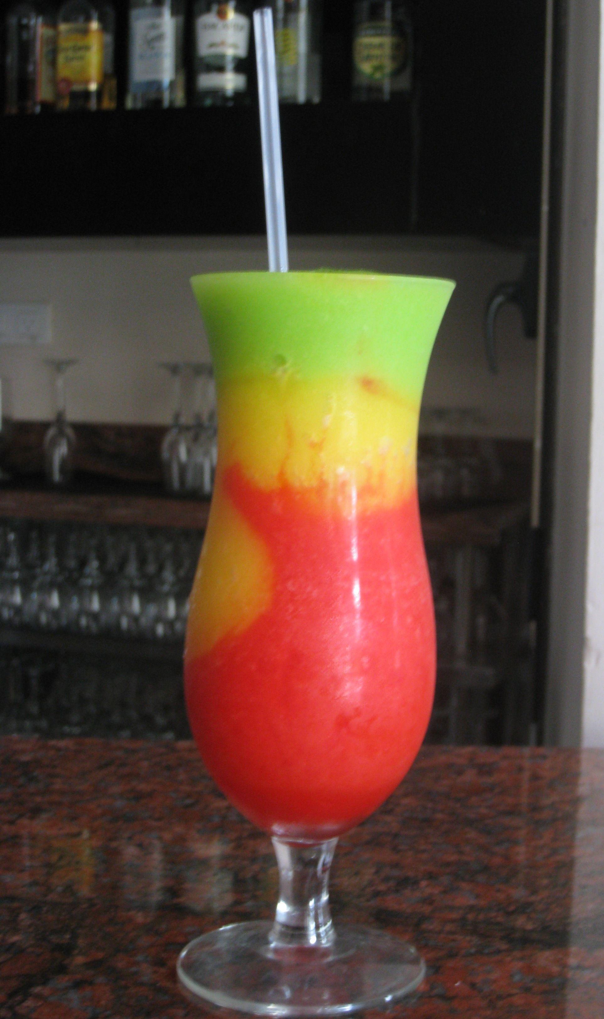 Red and Yellow Beverage Logo - Bob Marley: blend 1 oz light rum, 4 oz strawberry daiquiri mix