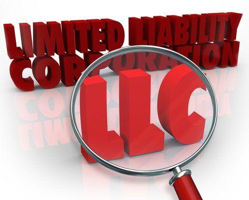 White Circle with Red Comma Logo - Does a Comma Go in Front of LLC or Inc.? | LegalZoom