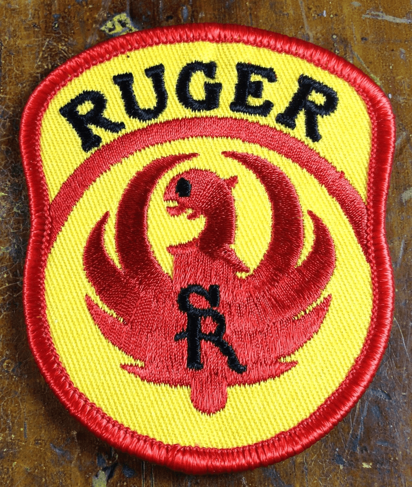 Yellow Bird with Red Circle Logo - Ruger Firearms Guns Company Yellow with Red Phoenix Bird Logo ...