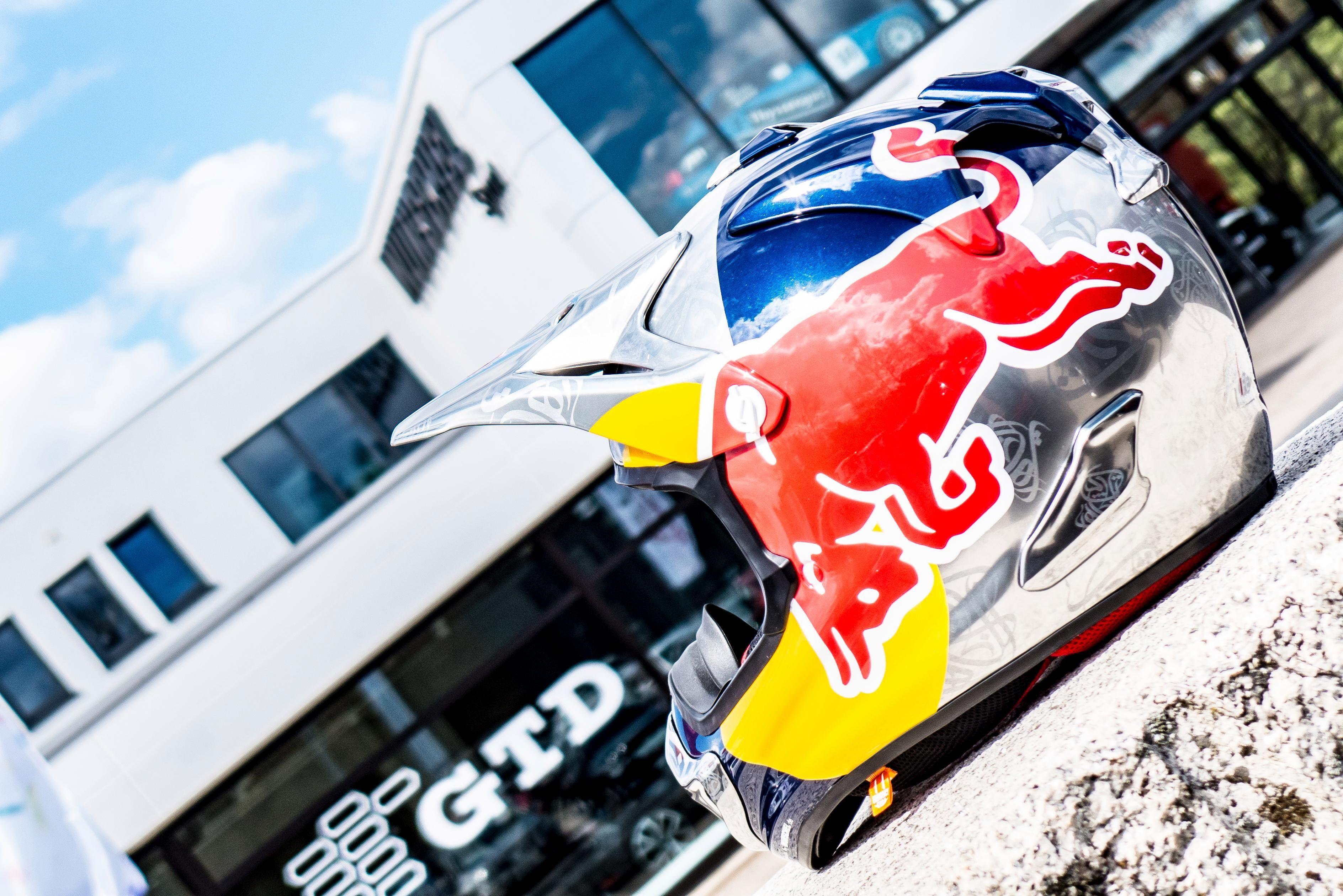 Red Bull Car Logo - Creativity: The man Behind Al-Attiyah's helmet designs