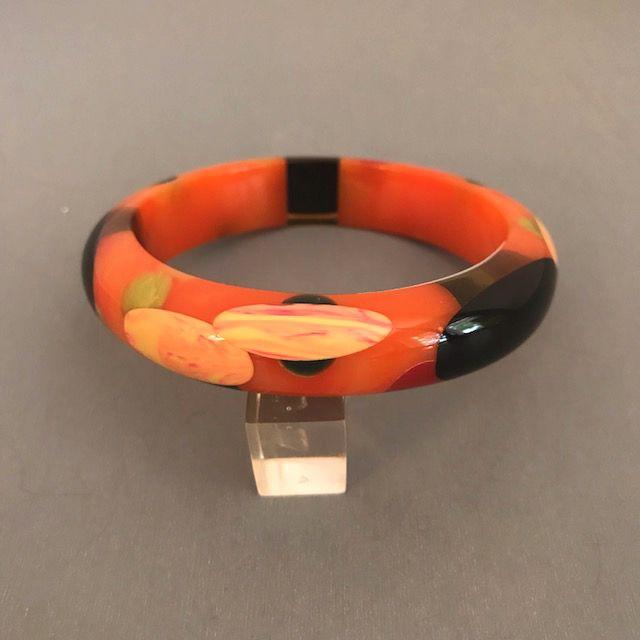 Dots Orange Spiral Logo - SHULTZ bakelite bangle orange swirl, apple juice inserts, dots