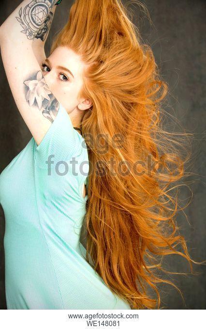 Woman with Flowing Hair with Back Logo - Long flowing hair down her back Stock Photos and Images | age fotostock