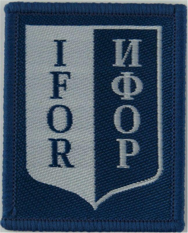 White with Blue Rectangles Logo - IFOR Armbadge (Shield On 57mm X 46mm Rectangle) Military Formation arm