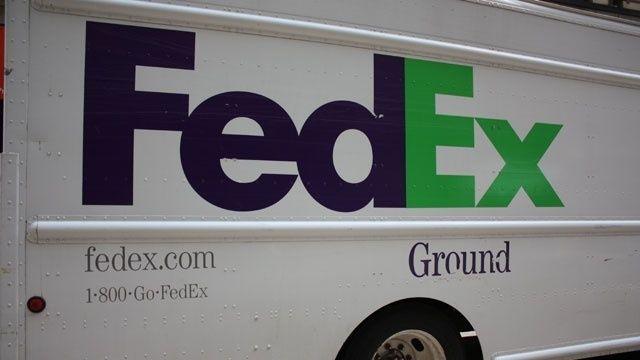 Groumd Federal Express Logo - FedEx Ground delivery vehicle. FedexTheWorldOnTime>