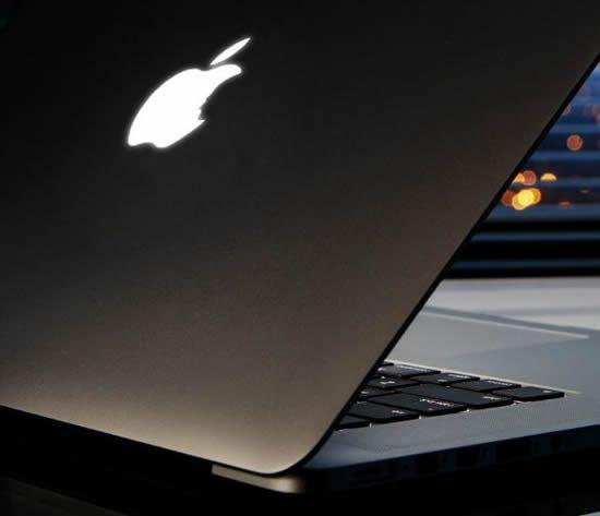 Apple Laptop Logo - Steve Jobs Tribute MacBook Pro flaunts Apple logo with silhouette of ...