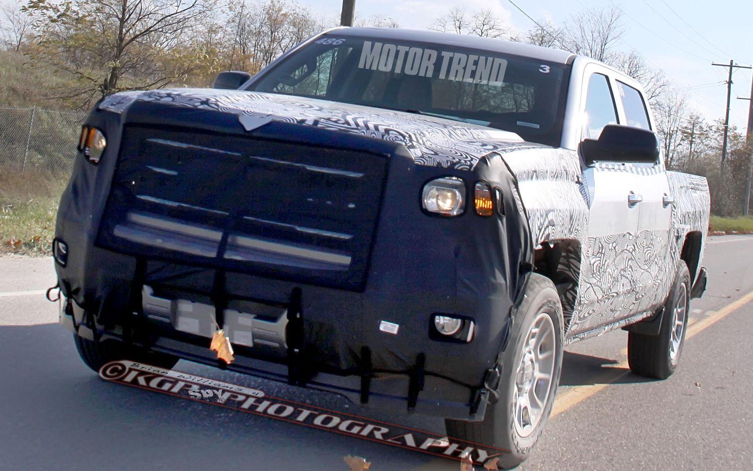 Camo Chevrolet Truck Logo - Spied! 2014 Chevrolet Silverado and 2014 GMC Sierra with Less Camo ...