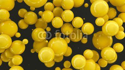 Black and Yellow Sphere Logo - Yellow spheres of random size on black background. Buy Photo. AP