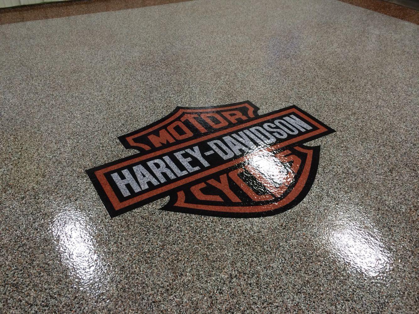 Garage Floor Logo - Epoxy chip garage floor with Harley Davidson logo installed