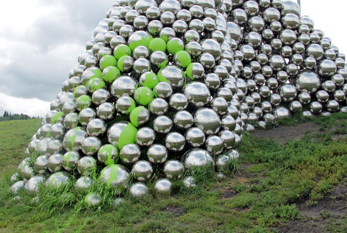 Green with Silver Ball Logo - Controversial art installation Talus Dome silver balls covered in ...
