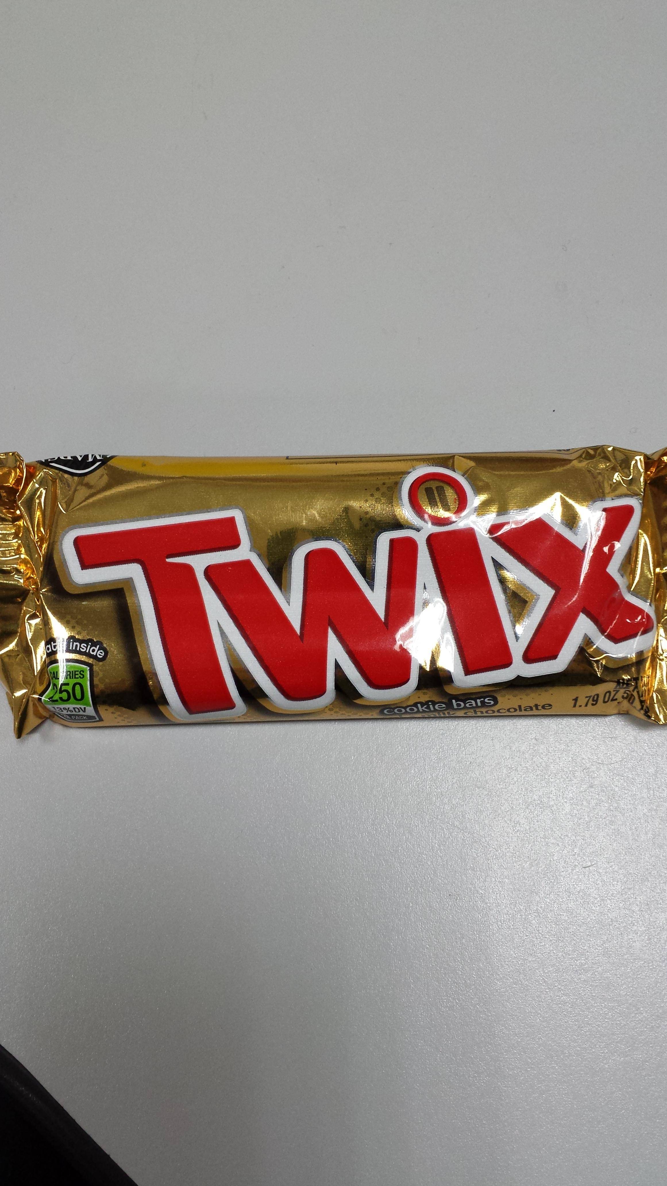 Twix Logo - The dot over the i in the Twix logo has Twix bars in it