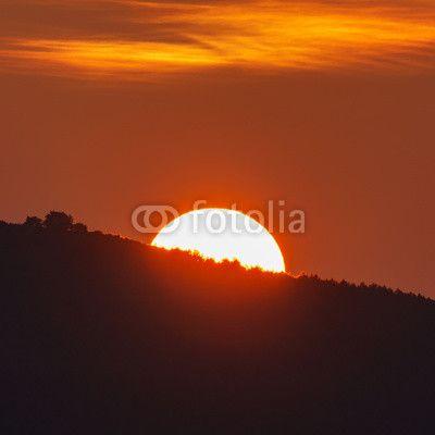 Orange Sun Behind Mountain Logo - Sun behind mountain at sunrise, orange colors. Buy Photo. AP