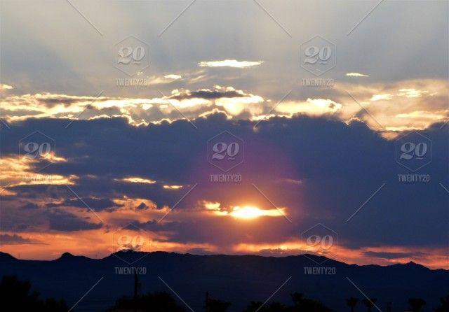 Orange Sun Behind Mountain Logo - Golden Rays of Summer Sunset! An orange ball of sun is setting ...