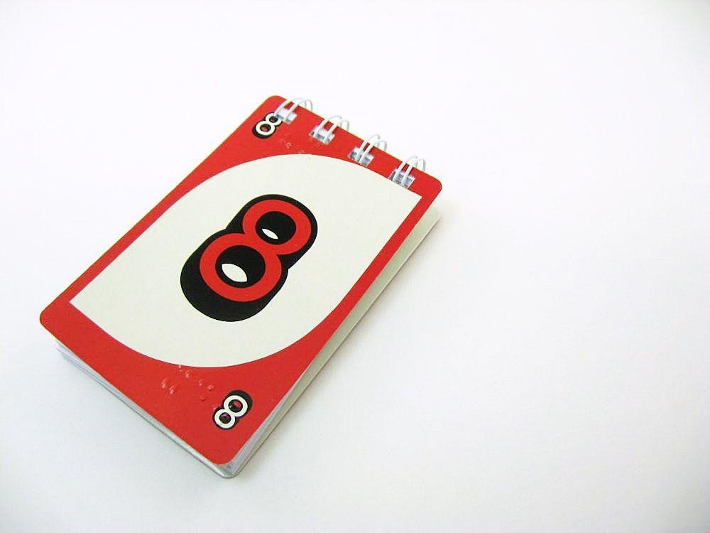 Black N Red and Yellow Logo - Braille UNO Notebooks Recycled UNO cards black, white, red, green