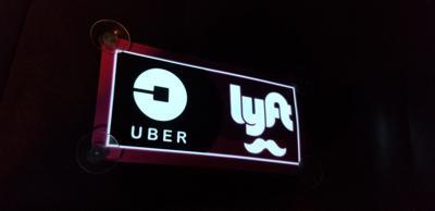 Sharing Economy Uber Lyft Logo - Opinion. The sharing economy doesn't share in your trust. Opinion